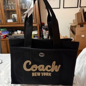 Coach 42 inch Black Canvas Tote